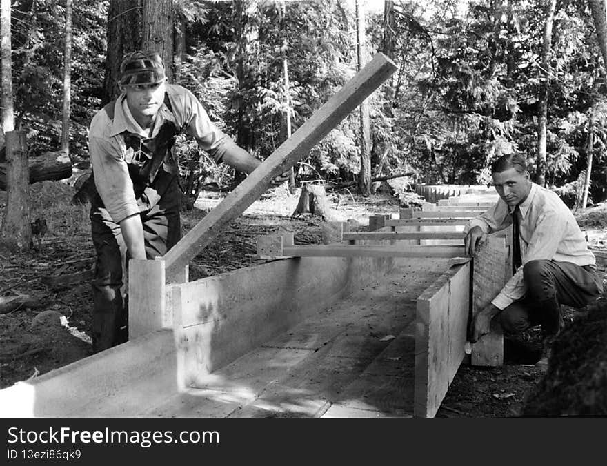 Arthur King, Soil Specialist At Oregon State College, Demonstrates How To Build A Flume, Circa 1930