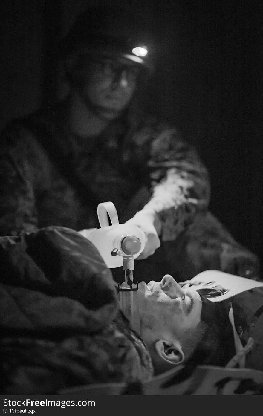 190612-N-TH560-0494 CAMP GONSALVES, Okinawa, Japan &#x28;June 12, 2019&#x29; Hospitalman Jesse King, top, from Oklahoma City, pumps a manual resuscitator applied to simulated patient Hospital Corpsman 3rd Class Kevin Gizara, a Jungle Medicine Course instructor at Jungle Warfare Training Center, during a field exercise. As part of the course’s final evolution, students were evaluated on their ability to treat and sustain patient lives following a simulated ambush. The 10-day medical course trains Navy medical personnel assigned to Marine forces on jungle survival skills, patient tracking, field medical care, and casualty evacuation techniques. &#x28;U.S. Navy photo by Mass Communication Specialist 2nd Class Jeanette Mullinax&#x29;