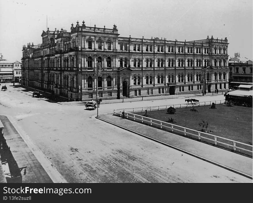 Photographer: unidentified

Location: Brisbane

Description: The Treasury Building, at the corner of George and Queen Streets, was erected in three stages between 1886 and 1928. In 1883 a design competition for a two-storeyed building was won by Melbourne architects Grainger and D&#x27;Ebro. However this design was never used as the Queensland Colonial Architect, John James Clark, argued that the site warranted a four-storeyed complex. Clark&#x27;s own design, entered in the competition prior to his appointment, was used. When completed in September 1889, the new building was occupied by the Premier, Colonial secretary, Registrar-General, Treasury, Mines, Works, Police and Auditor-General.


Stage two which completed the Elizabeth Street section was commenced almost immediately and was completed by February 1893. This new wing was occupied by the Registrar of Titles, Justice, Works, Public Instruction and the State Savings Bank. Work on the third state commenced in 1922 and officially opened in 1928, providing expanded accommodation for the existing tenants. The building is now home to an international casino and restaurants. 

View this page at the State Library of Queensland  hdl.handle.net/10462/deriv/67261 
Information about State Library of Queensland’s collection: www.slq.qld.gov.au/resources/picture-queensland. Photographer: unidentified

Location: Brisbane

Description: The Treasury Building, at the corner of George and Queen Streets, was erected in three stages between 1886 and 1928. In 1883 a design competition for a two-storeyed building was won by Melbourne architects Grainger and D&#x27;Ebro. However this design was never used as the Queensland Colonial Architect, John James Clark, argued that the site warranted a four-storeyed complex. Clark&#x27;s own design, entered in the competition prior to his appointment, was used. When completed in September 1889, the new building was occupied by the Premier, Colonial secretary, Registrar-General, Treasury, Mines, Works, Police and Auditor-General.


Stage two which completed the Elizabeth Street section was commenced almost immediately and was completed by February 1893. This new wing was occupied by the Registrar of Titles, Justice, Works, Public Instruction and the State Savings Bank. Work on the third state commenced in 1922 and officially opened in 1928, providing expanded accommodation for the existing tenants. The building is now home to an international casino and restaurants. 

View this page at the State Library of Queensland  hdl.handle.net/10462/deriv/67261 
Information about State Library of Queensland’s collection: www.slq.qld.gov.au/resources/picture-queensland