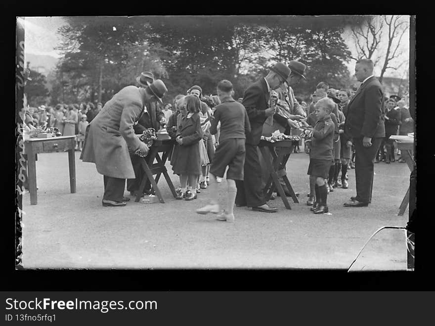 Coronation of King George VI - children receive flags