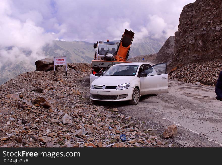 Building an access road in the mountains can be complicated and expensive. Avoid entering onto the public road in a curve or at the top of a hill. Building an access road in the mountains can be complicated and expensive. Avoid entering onto the public road in a curve or at the top of a hill.