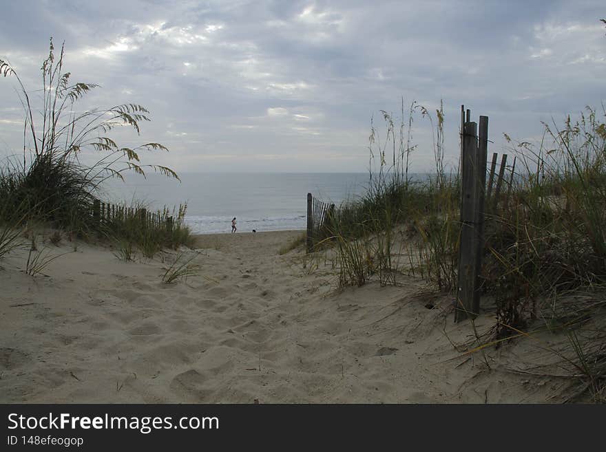 The path to the beach from summer rental home right on the beach.  Duck, North Carolina, Outer Banks Barrier Islands. peaceful, a bit overcast kind of day. 
beautiful. namaste, peace, love, fun, relaxation,. The path to the beach from summer rental home right on the beach.  Duck, North Carolina, Outer Banks Barrier Islands. peaceful, a bit overcast kind of day. 
beautiful. namaste, peace, love, fun, relaxation,