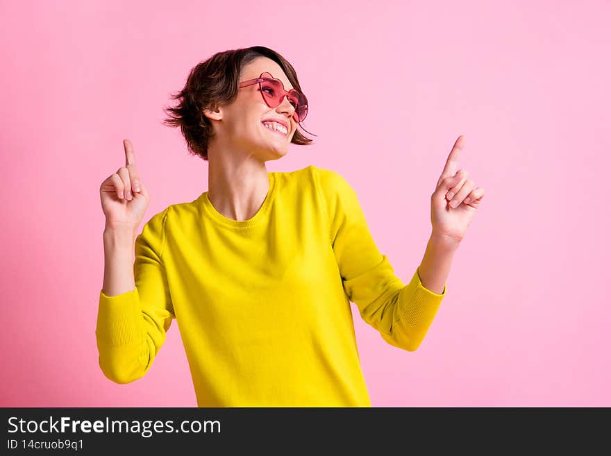 Photo of young pretty lovely smiling cheerful good mood girl dancing wear funky glasses isolated on pink color