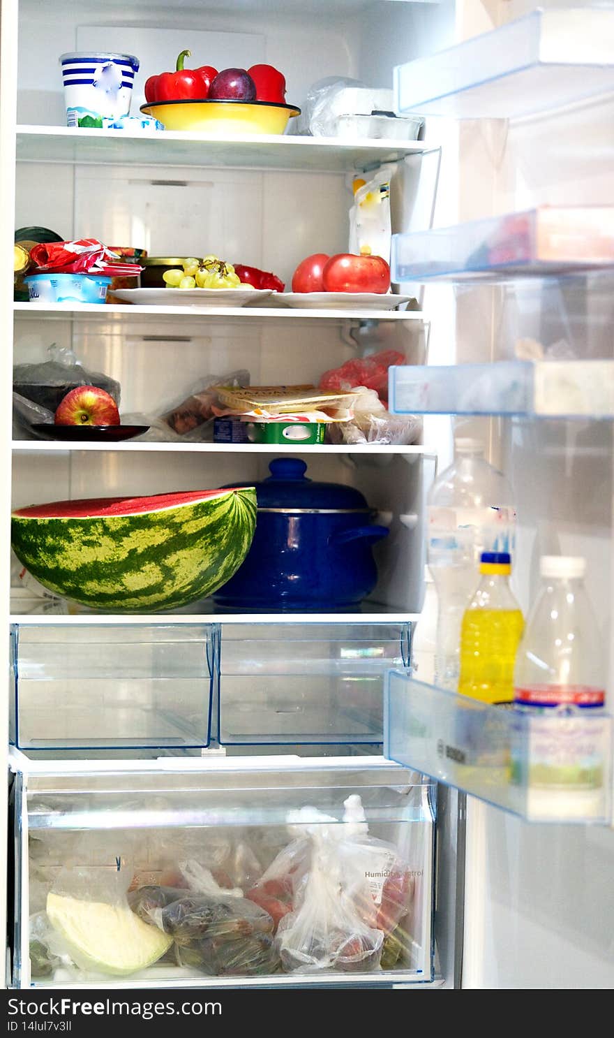 Food lies in the refrigerator in the kitchen, food storage