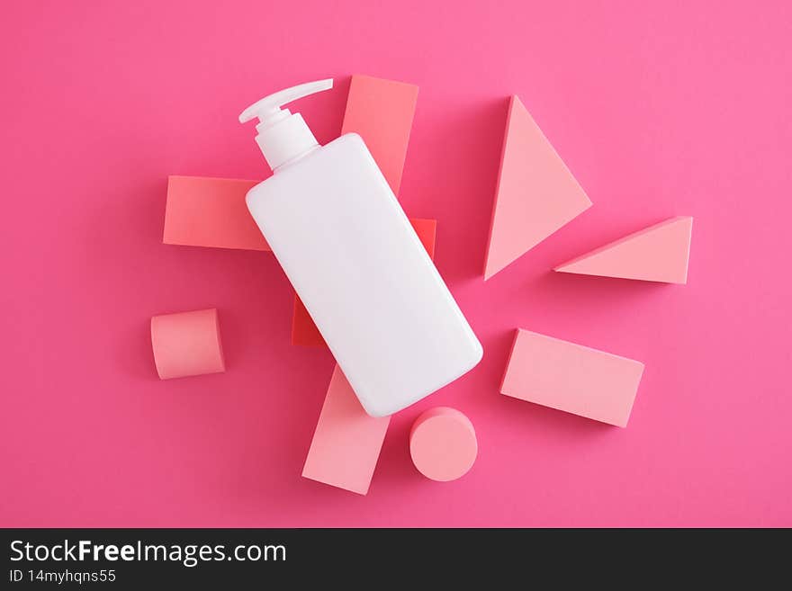 white mock up cosmetic bottle with dispenser and podiums, platform for product presentation on pink background