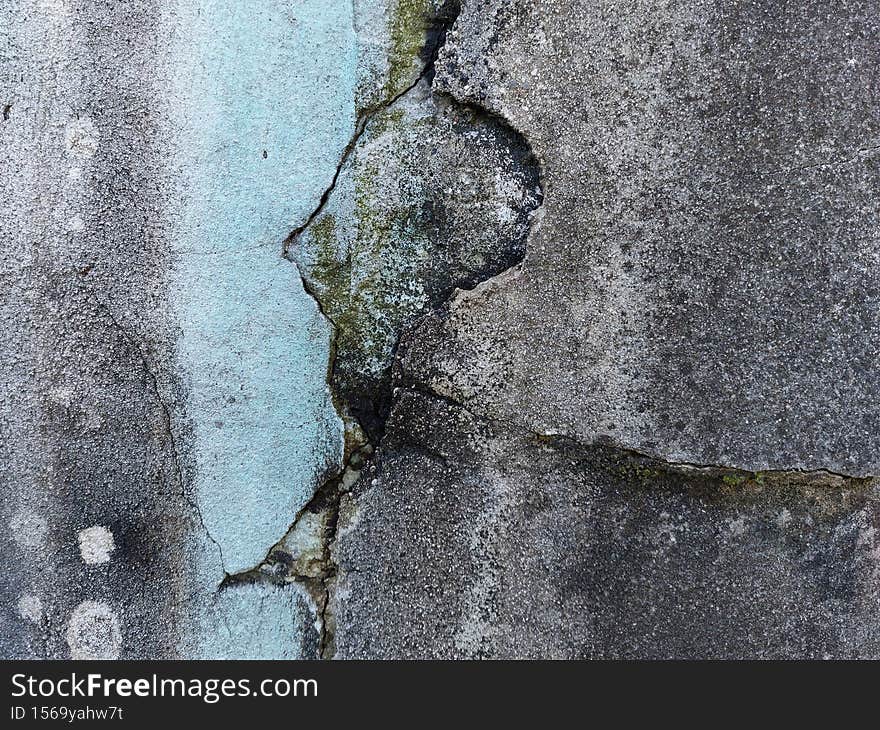 Cracked Wall With Blue Stripe Colored By Water