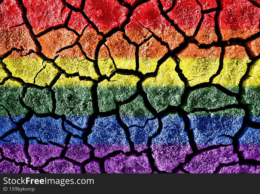 LGBT - colors on a background from cracked dried earth