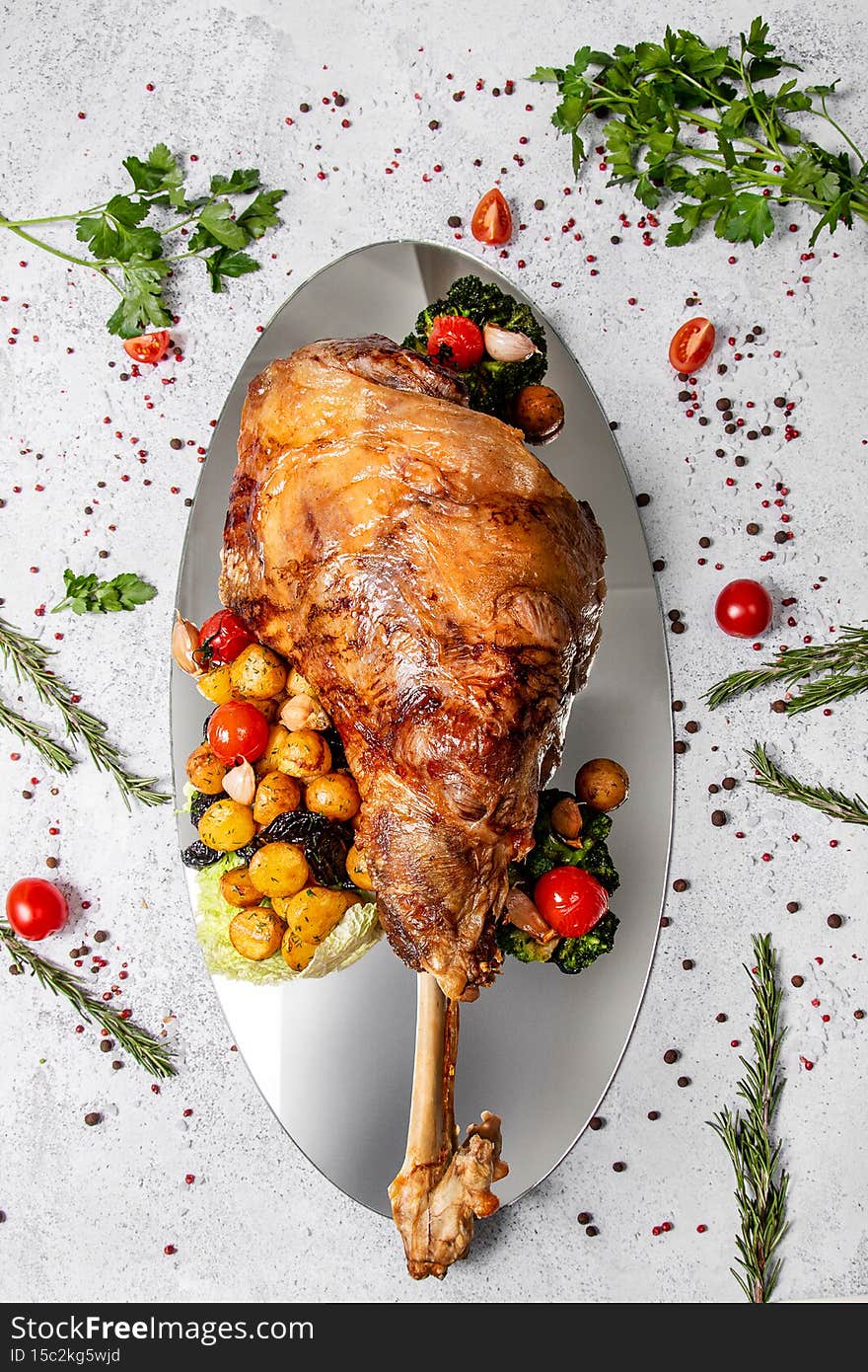 Appetizer of vegetables, raw foods and baked meat. Serving of products for menu concept. Several plates of cooked food