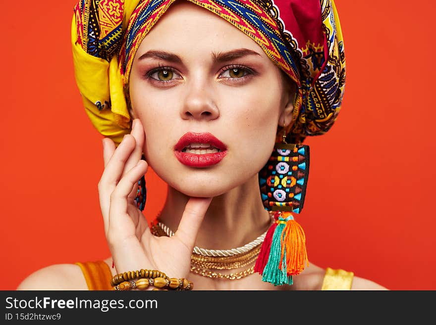 beautiful woman in multicolored turban attractive look Jewelry Studio Model. High quality photo
