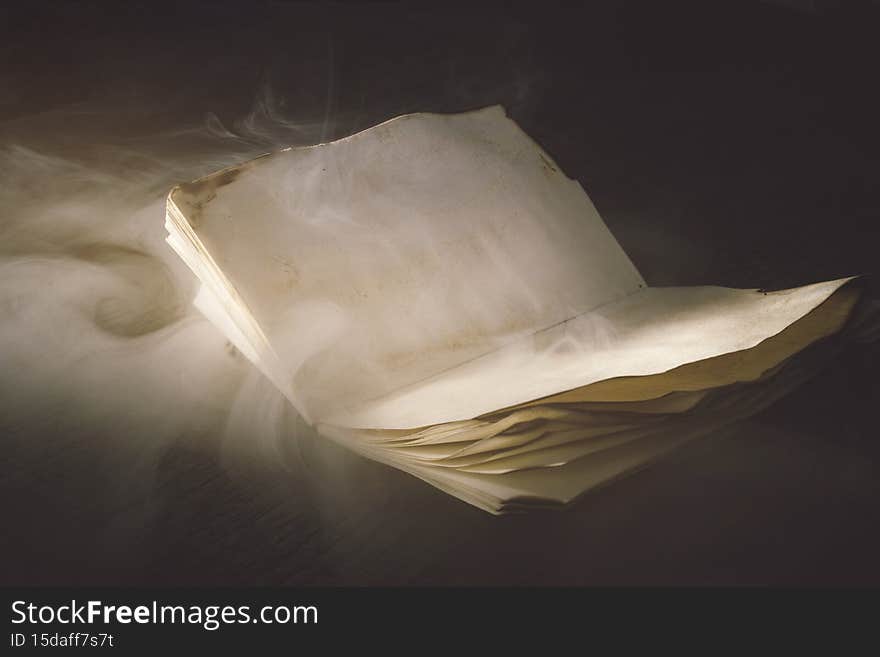 smoke ver old notebook. High quality photo