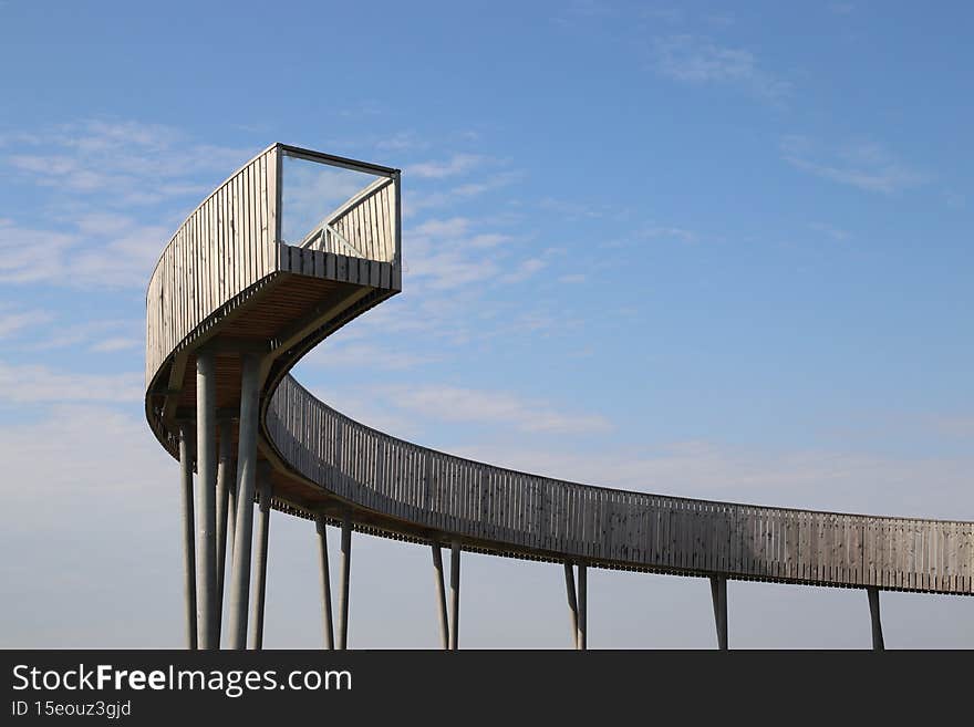 The modern spiral lookout tower in the middle of vineyards