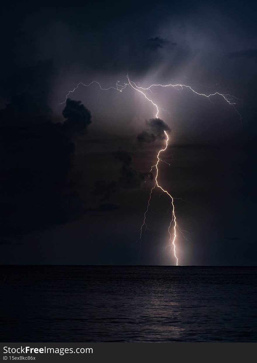 A beautiful scenery of the lightning over a lake, Miramar Beach, Florida