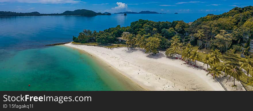 Beautiful tropical island koh Kham, white sand beach with volcanic rocks, Thailand. View from a height