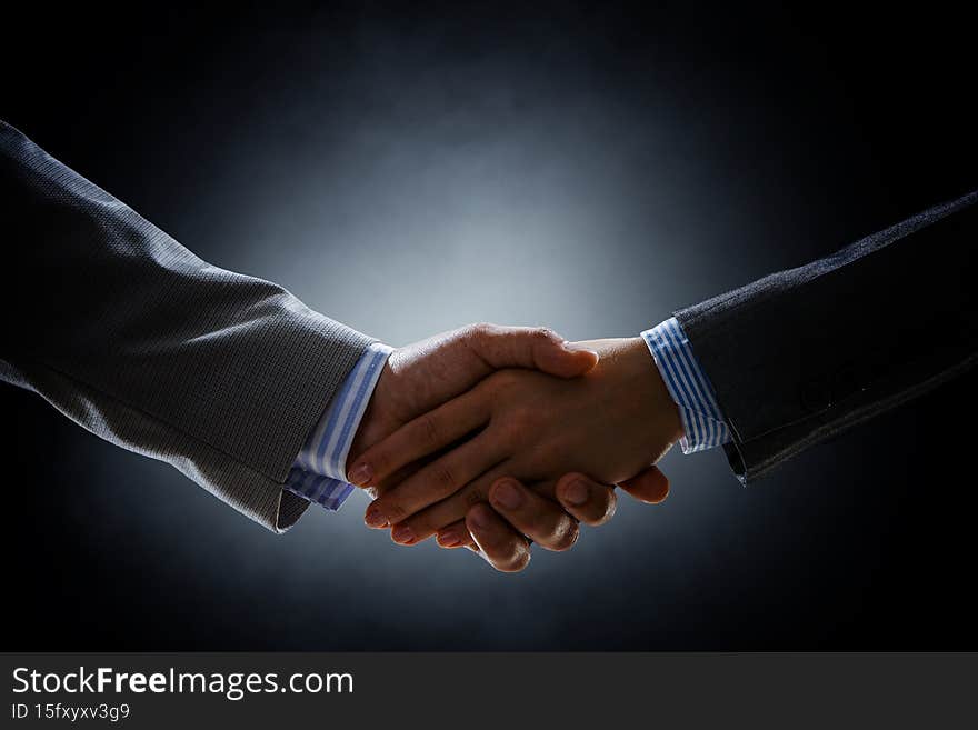 Concept of partnership and teamwork. Mixed media. Concept of partnership and teamwork. Mixed media