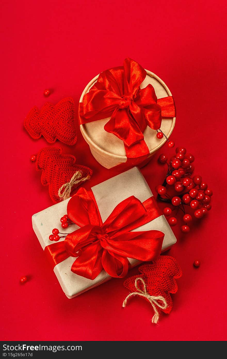 Gift concept in red colors. New Year or Christmas, festive mood