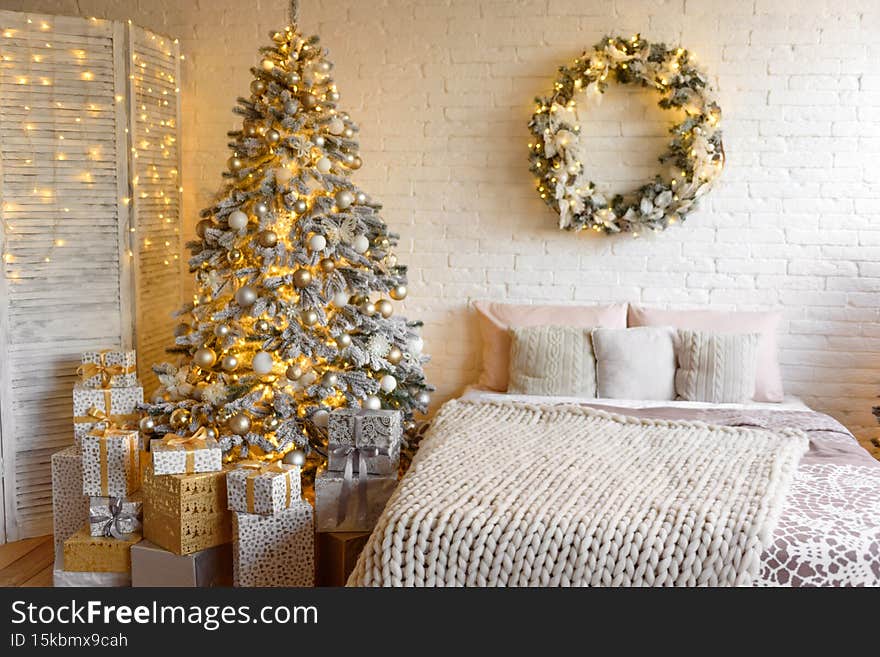 Christmas and New Year decorated interior room with presents and New year tree