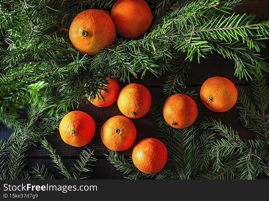 Christmas Composition With Tangerines And Spruce Branch