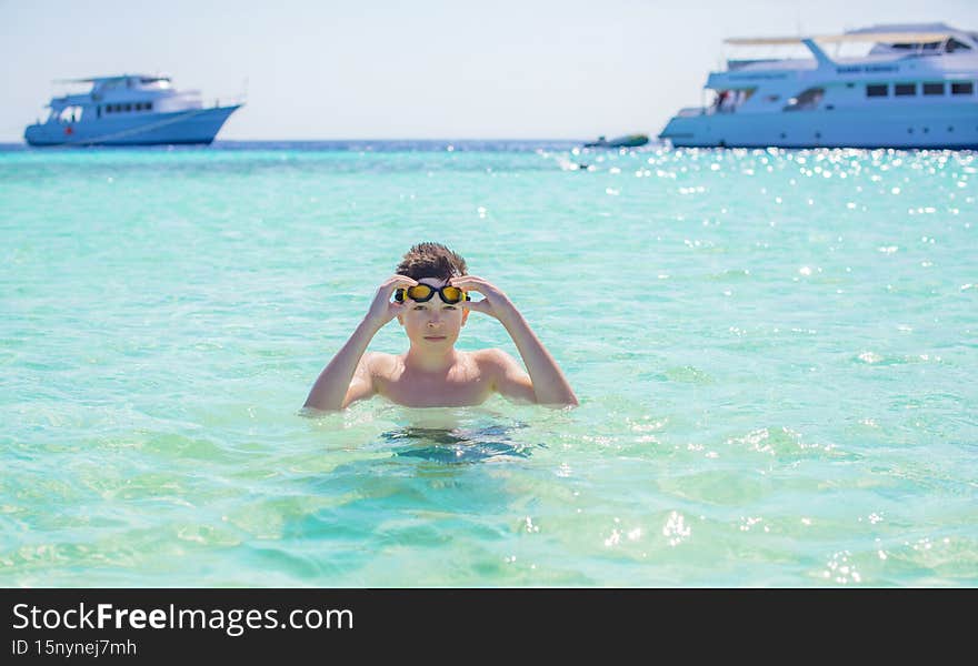 Boy at beach, rest in vacation