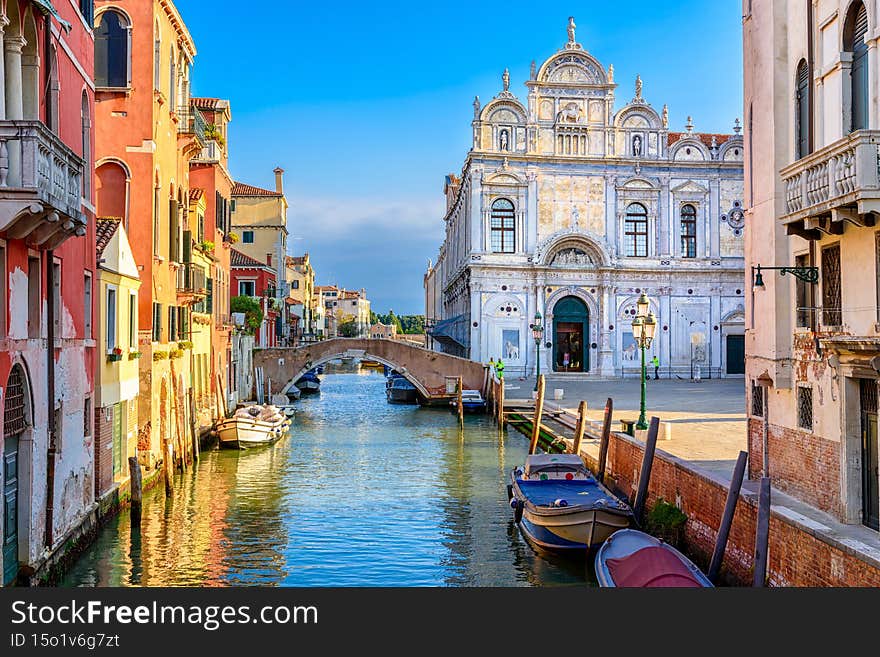 Narrow canal with bridge in Venice, Italy. Architecture and landmark of Venice. Cozy cityscape of Venice