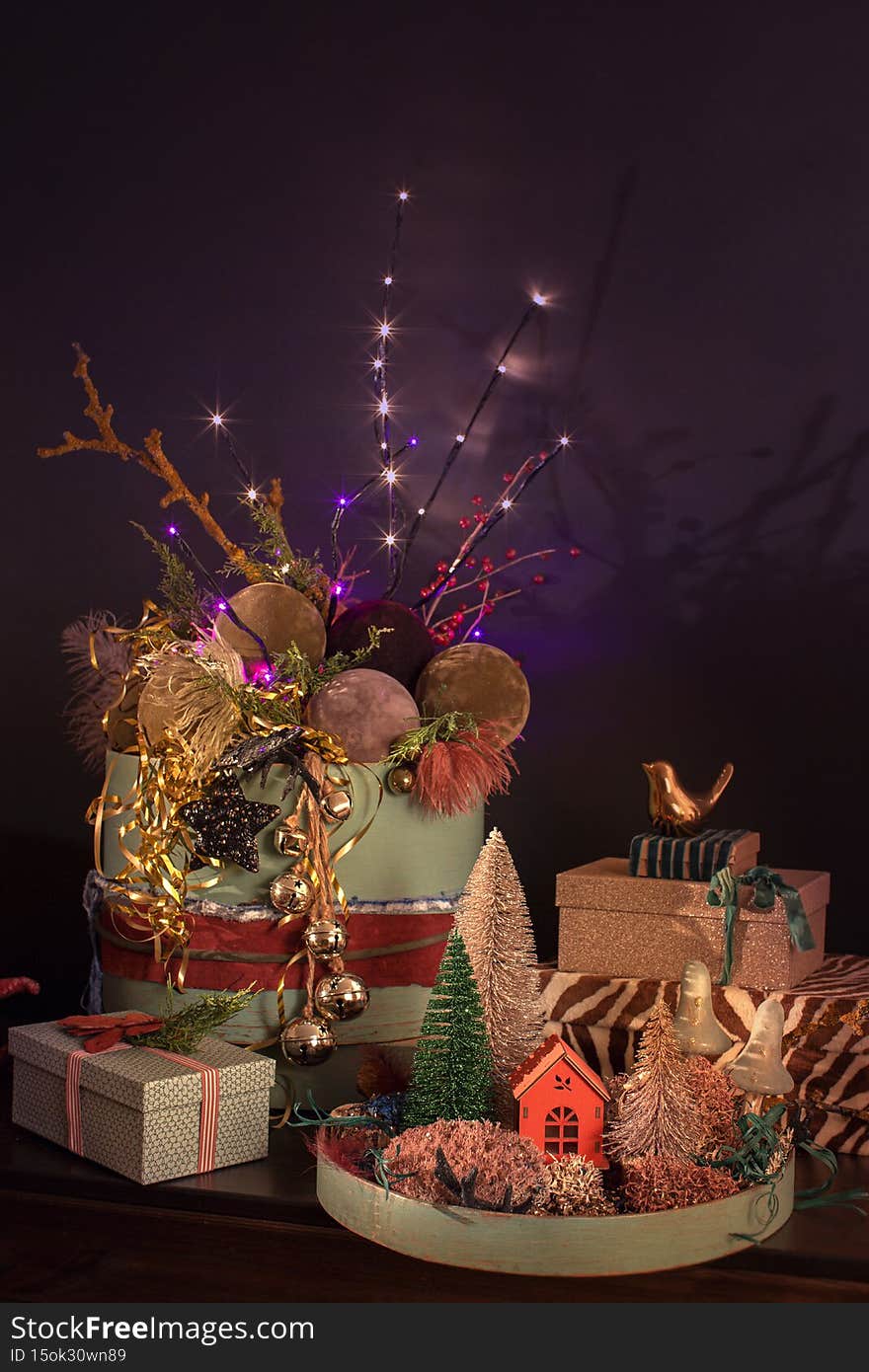 Christmas 2022 decor with a Christmas decorated with New Year s toys, garlands and balls near the bench. New Year s