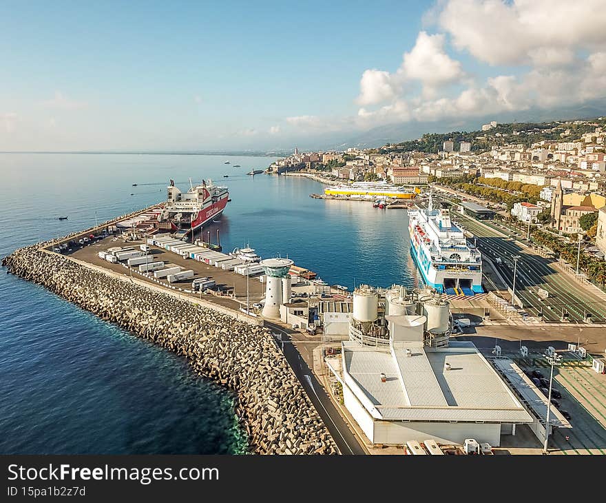 Boat and Sailboat around harbor zone with commercial docs. Leisure port is close to the commerical cruise ships to go to France or Italie. Boat and Sailboat around harbor zone with commercial docs. Leisure port is close to the commerical cruise ships to go to France or Italie