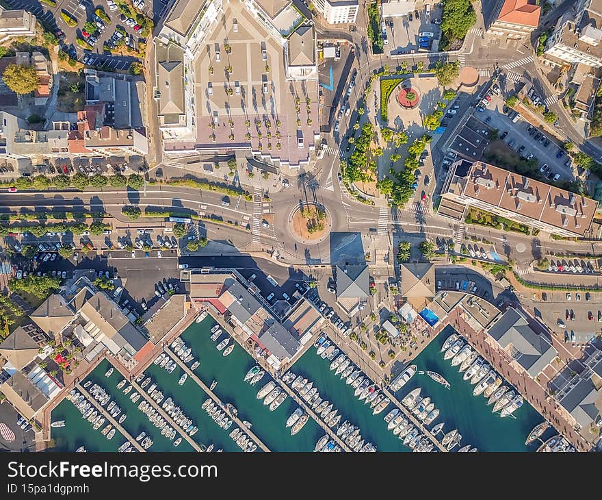 Boat and Sailboat around harbor zone with commercial docs. Leisure port is close to the commerical cruise ships to go to France or Italie. Boat and Sailboat around harbor zone with commercial docs. Leisure port is close to the commerical cruise ships to go to France or Italie