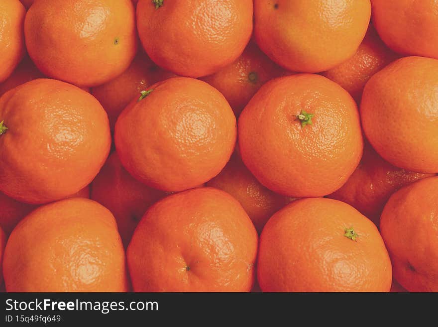 Mandarin orange background. Top view.