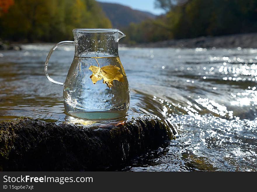 Cool clear water of a mountain river. Clean potable water. Cool clear water of a mountain river. Clean potable water