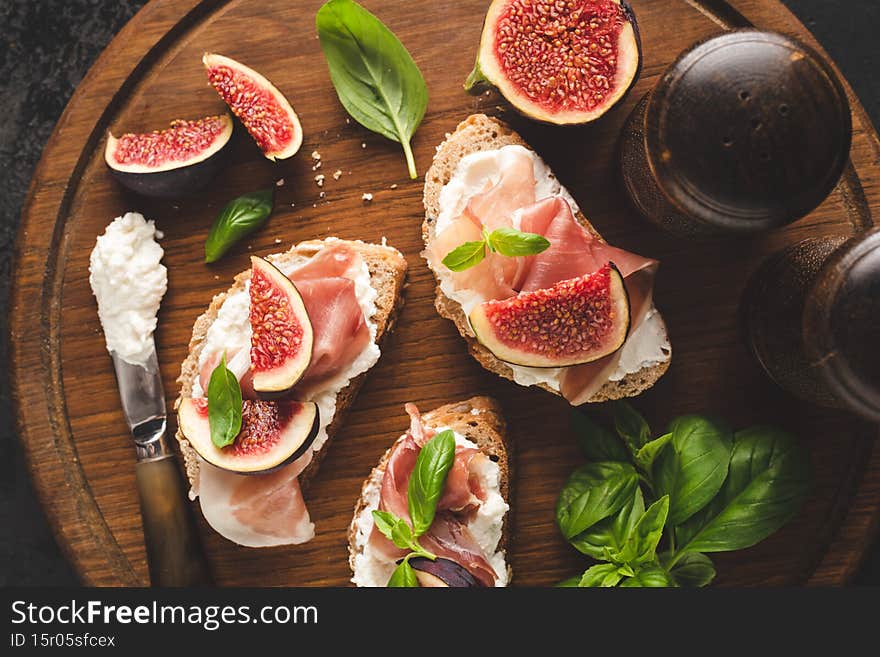 Italian ham and cheese appetizer bruschetta with figs