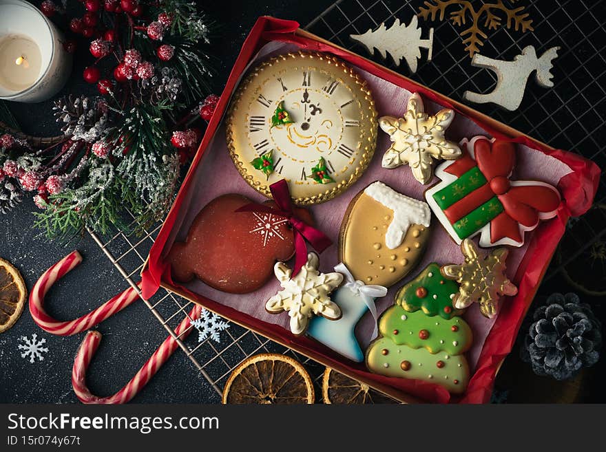 Flat lay of Christmas gingerbread cookies with festive icing. Merry Christmas and Happy New Year