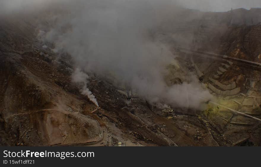 An egg-producing factory covered by sulphuric smoke in a volcanic valley in Hakone, Kanagawa, Japan. An egg-producing factory covered by sulphuric smoke in a volcanic valley in Hakone, Kanagawa, Japan.