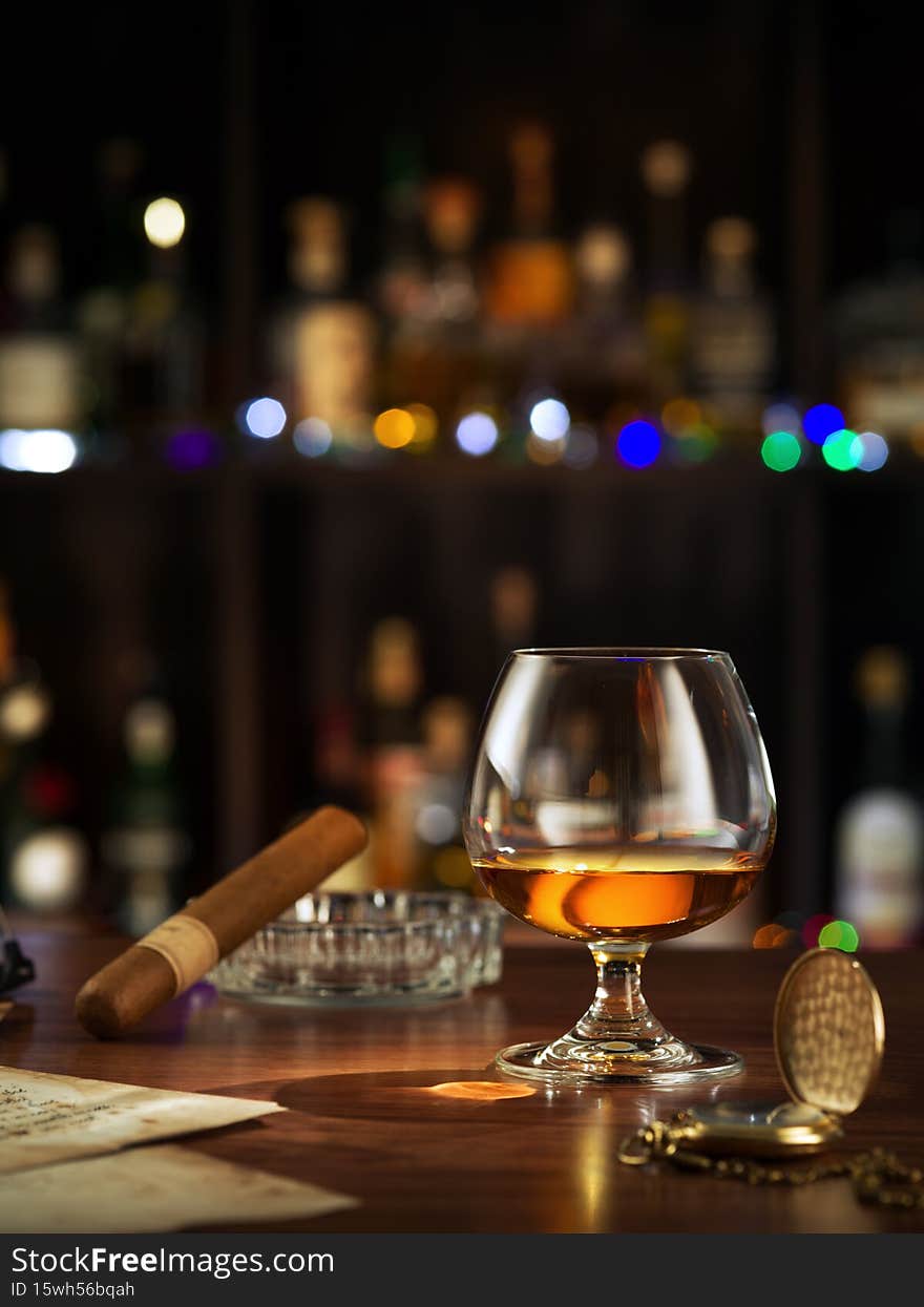 With cigar on top on color back.