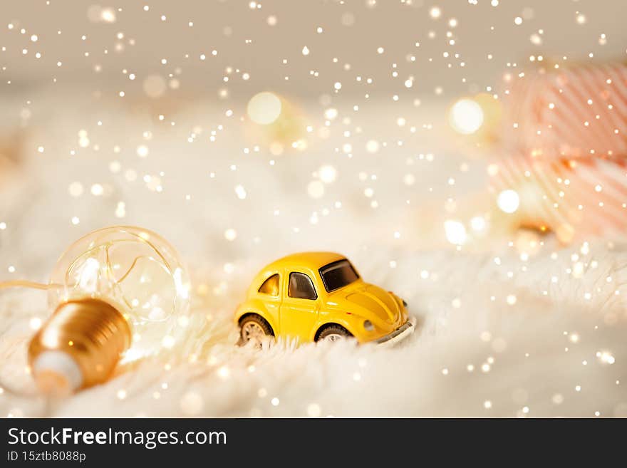 Merry Christmas and 2022 Happy New Year banner with yellow color trendy toy car decorations for christmas design on
