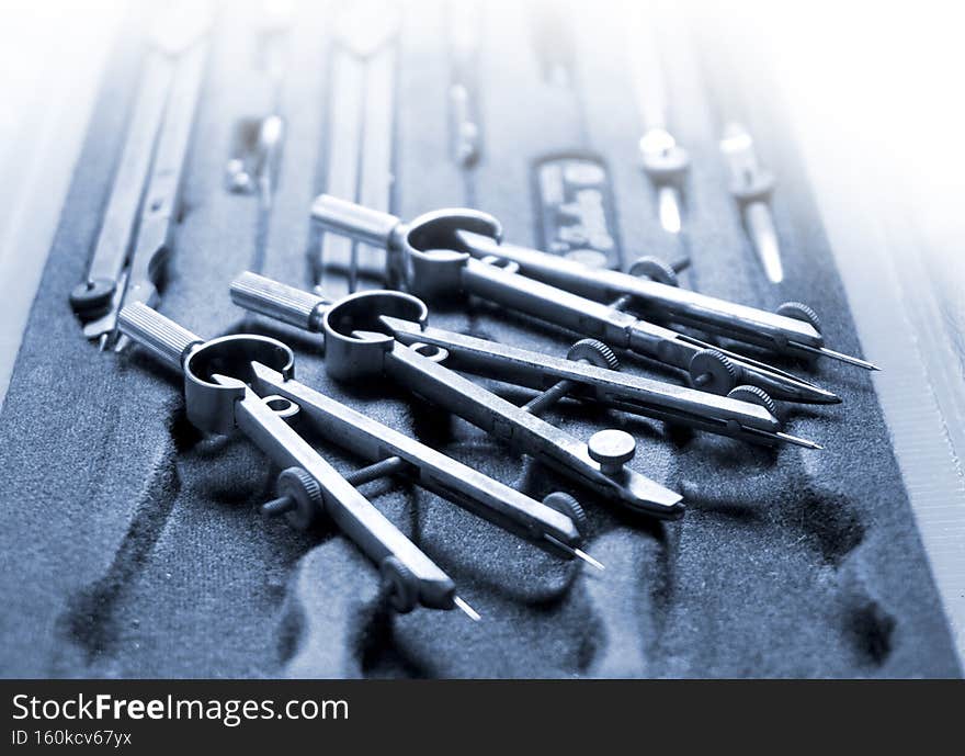 Retro metal drawing tools in box set. - Image. Retro metal drawing tools in box set. - Image