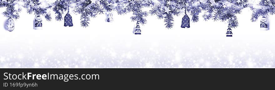 Christmas border - fir branches, snow, shiny ribbon, Xmas toys in color of 2022 year Very Peri