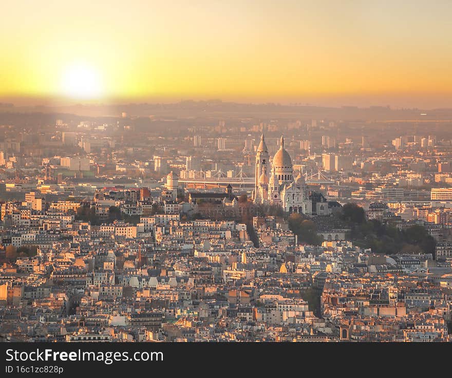 Panorama of Paris with Sacre Coeur Cathedral during golden hour in Paris, France