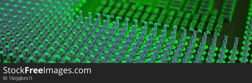Computer processor close-up. Bright green tinted banner. Information technology headline. A pattern of contacts and semiconductors of a PC microprocessor. Macro