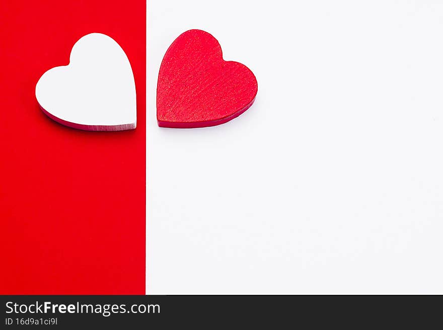 Greeting card. Love concept.Template on the theme of valentine's day, romantic letterhead for cards, invitations, copy space.Two hearts red and white on a mixed background white and red. Greeting card. Love concept.Template on the theme of valentine's day, romantic letterhead for cards, invitations, copy space.Two hearts red and white on a mixed background white and red.