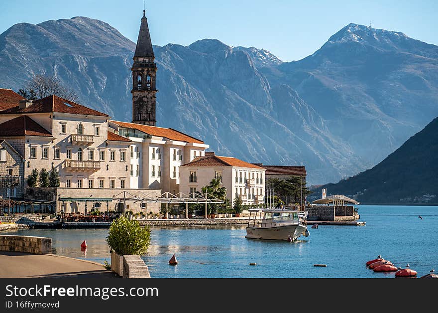 Historic city of Perast at Bay of Kotor in summer, Montenegro. Scenic panorama view of historic town of Perast located at world famous Bay of Kotor on a beautiful sunny day with blue sky in summer. Historic city of Perast at Bay of Kotor in summer, Montenegro. Scenic panorama view of historic town of Perast located at world famous Bay of Kotor on a beautiful sunny day with blue sky in summer