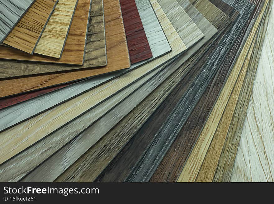 Examples of ready-made vinyl flooring for interior work.