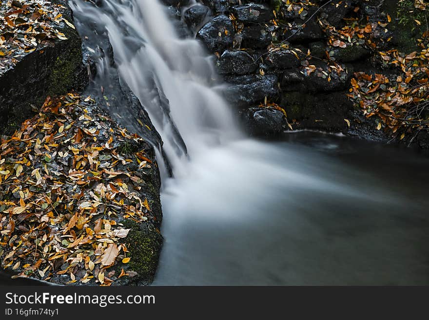 Small waterfall in the Benejar river in Aldeire, Granada - Spain.