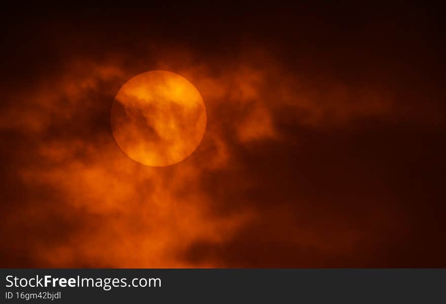 The sun was covered with a black cloud