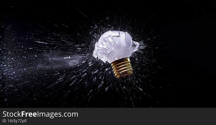 Explosion of a small traditional electric light bulb. Explosion of a small traditional electric light bulb