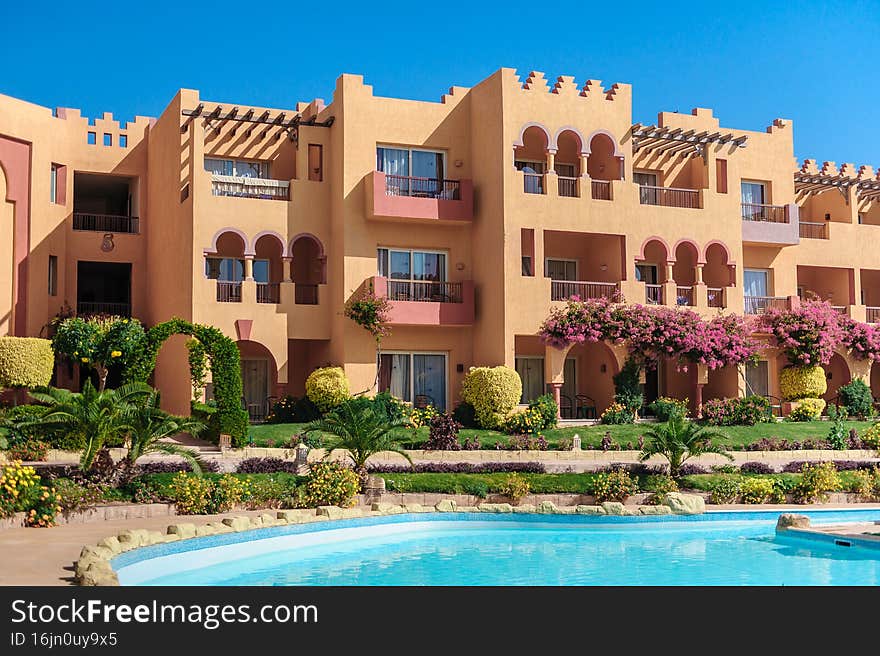 Beautiful swimming pool and palm trees in Egypt