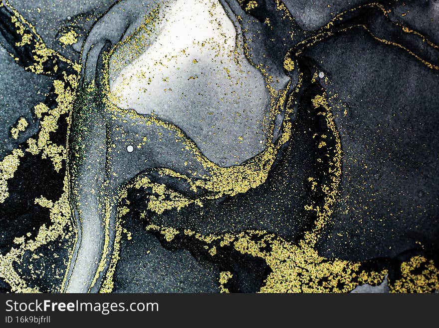 Abstract bright shiny color fluid background, hand drawn alcohol painting with golden streaks. Liquid ink technique texture backdrop design