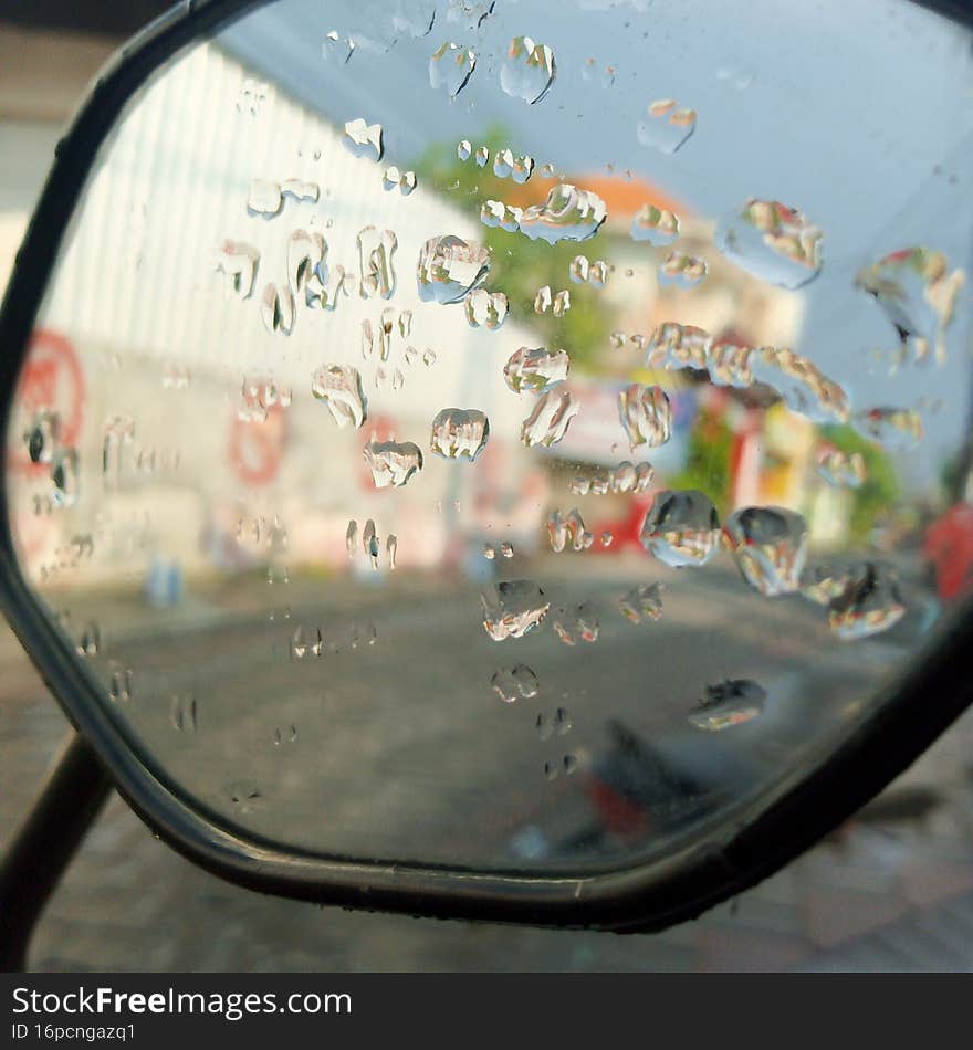 abstract rear view mirror photo on highway at daytime, natural background, by photography, Indonesia, February 8, 2022. abstract rear view mirror photo on highway at daytime, natural background, by photography, Indonesia, February 8, 2022.