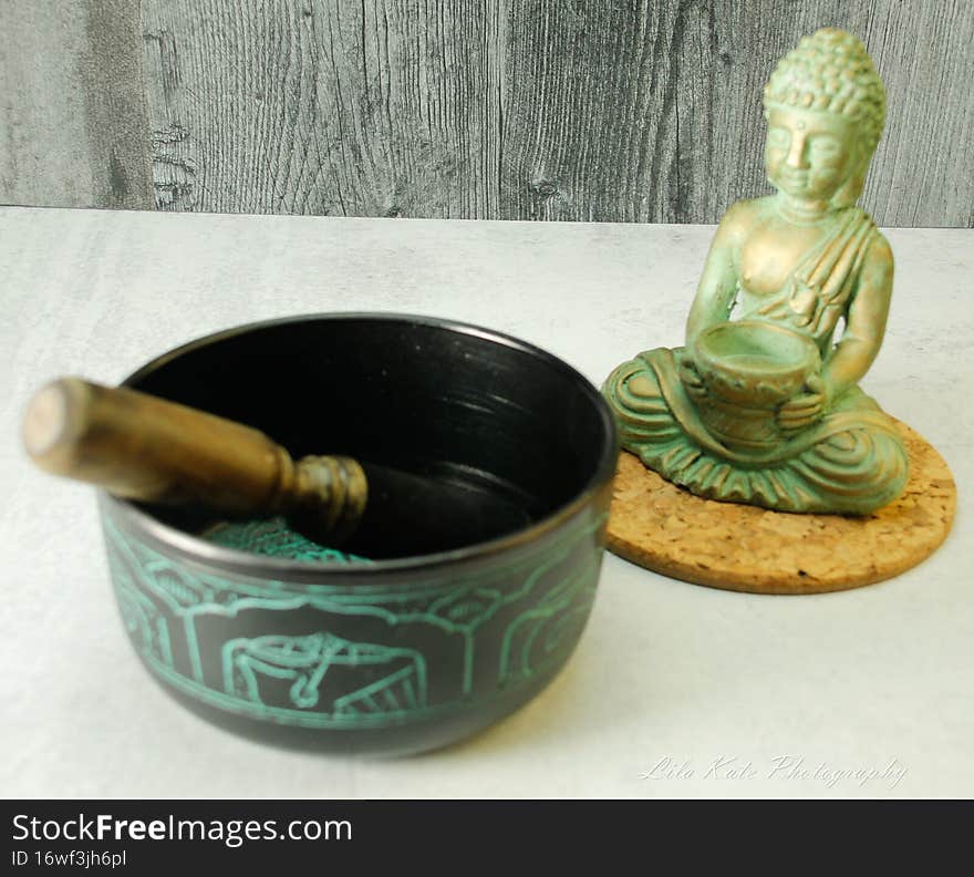 TIme to meditate, unwind, destress, focus, be mindful, practice patience, empathy, devotion, self time,  with a few items to help initiate.  buddha statue, tibetian singing bowl, with stick to make noise,  Meditation, peace, finding peace, joy, happiness. TIme to meditate, unwind, destress, focus, be mindful, practice patience, empathy, devotion, self time,  with a few items to help initiate.  buddha statue, tibetian singing bowl, with stick to make noise,  Meditation, peace, finding peace, joy, happiness.