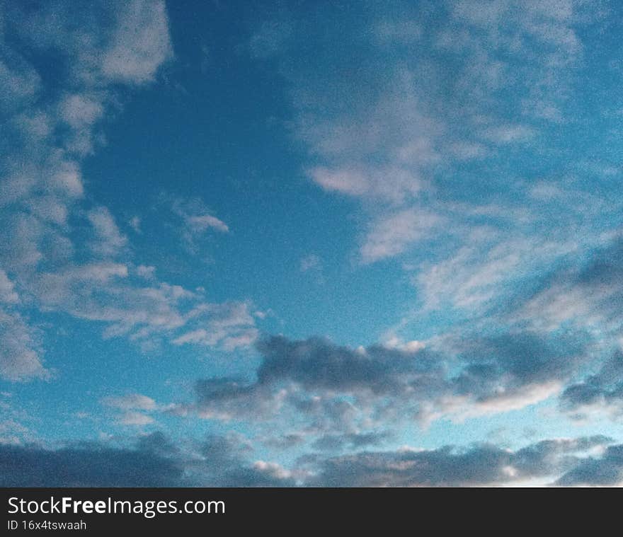 Blue sky with clouds at dusk city