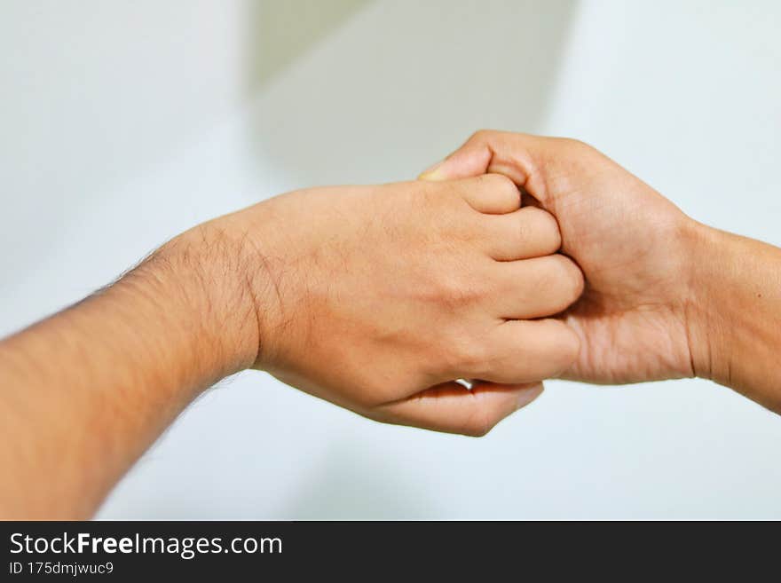 Close up view of rubbing the fingers with hand sanitiser.