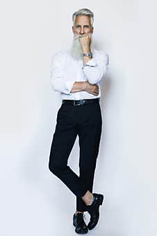Handsome Aged Male Model Posing On White Background Royalty Free Stock Photos